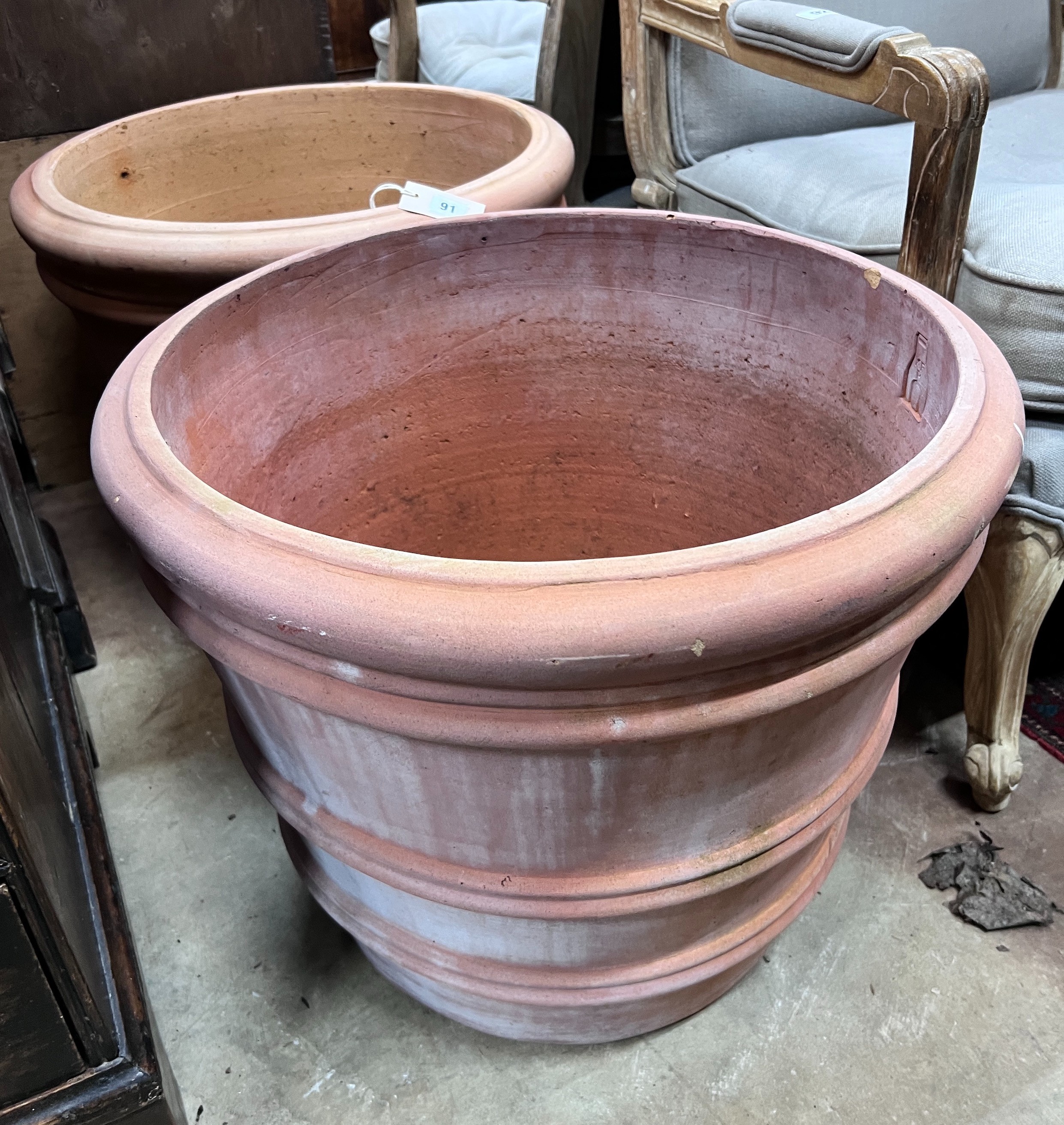 A pair of circular Italian terracotta planters, diameter 55cm, height 46cm *Please note the sale commences at 9am.